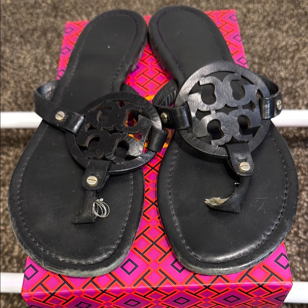 Tory Burch Black Sandals with Medallion Design